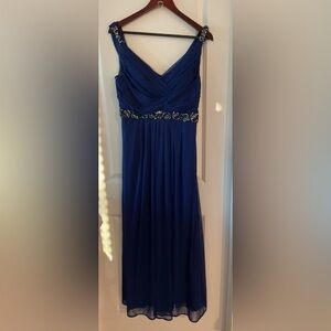 Elegant Blue Sleeveless Dress with Embellishments
